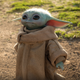 Illustration for article titled $350 Baby Yoda Figure Is An Exercise In Abject Terror